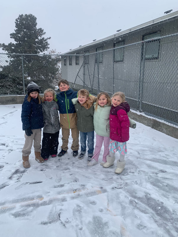 Students together outdoors in winter